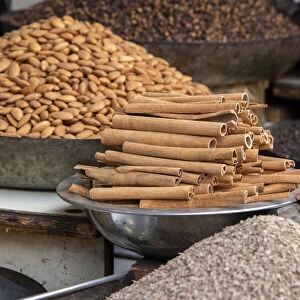 India, Delhi, Old Delhi. Old Delhi street market. Mixed nuts, spices and cinnamon sticks