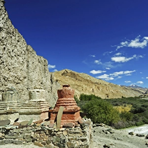 India, Ladakh, Markha Valley, white and colored stupa in scenic landscape of the