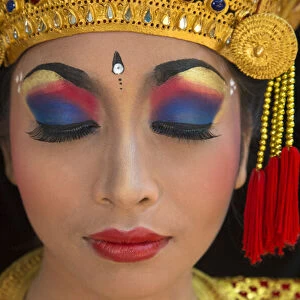 Indonesia, Bali. Close-up face of Balinese dancer. (MR)