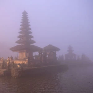 Indonesia, Bali. Foggy sunset on Pura Ulun Danu temple on Lake Bratan