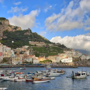 Italy, Amalfi. Boats in the harbor and coastal town of Amalfi