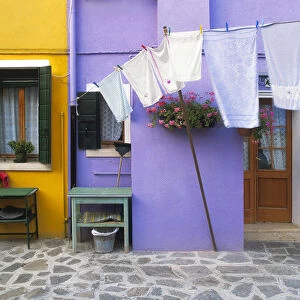Italy, Burano. Colorful house exterior. Credit as: Jim Nilsen / Jaynes Gallery / DanitaDelimont
