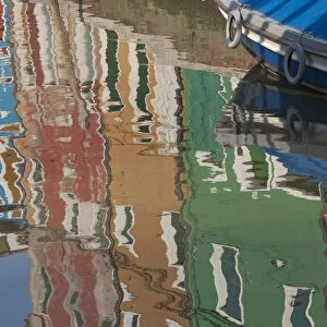 Italy, Burano, reflection of colorful houses in canal