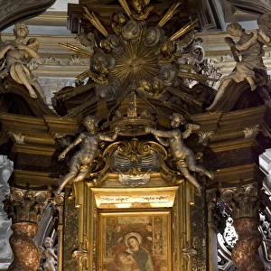 Italy, Parma. Detailed view of art adorning the altar at the Church of Mary of the Fence