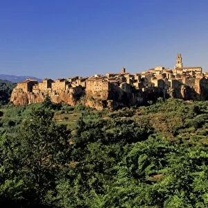 Italy, Tuscanny, Pitigliano. Late afternoon light on Tuscan hill town