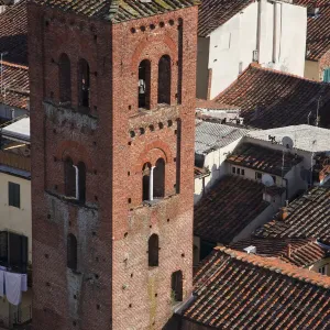 Italy, Tuscany, Lucca. The bell tower of the church San Pietro Somaldi, a Gothic-style, Roman Catholic church located on a Piazza Italy, Tuscany, Lucca. The bell tower of the church San Pietro Somaldi, a Gothic-style, Roman Catholic church located on a Piazza
