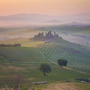 Italy, Tuscany, Val d Orcia. The Belvedere farmhouse at sunrise