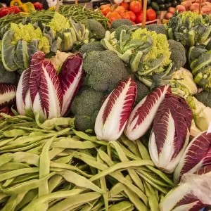 Italy, Venice. A variety of vegetables on display and for sale in the Rialto Market Italy, Venice. A variety of vegetables on display and for sale in the Rialto Market