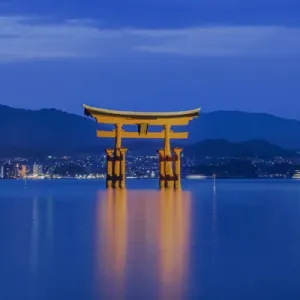 Japan, Miyajima, Itsukushima Shrine, Twilight Floating Torii Gate
