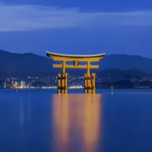 Japan, Miyajima, Itsukushima Shrine, Twilight Floating Torii Gate