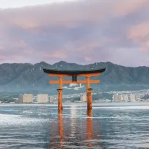 Japan, Miyajima, Itsukushima Shrine, Floating Torii Gate at Sunrise