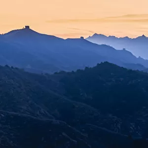 Jinshanling Mountains at sunrise in autumn colors, from Great Wall of China, Jinshanling