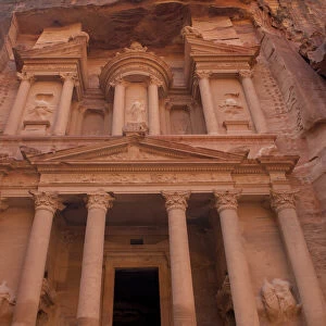 Jordan, Petra. Looking up at the massive face of the Treasury which was cut out of