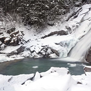 The Krimml waterfalls in the National Park Hohe Tauern during winter in ice and snow