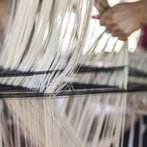 Laos, Vientiane. Traditional Lao textile loom