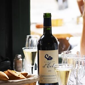 Le Bistrot des Alpilles restaurant, a bottle of Domaine d Eol on the table. Saint
