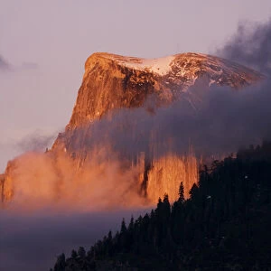 Last light falls on Half Dome as the sunsets - Yosemite National Park, California