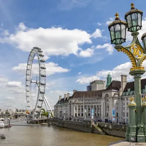 The London Eye and iconic British lamppost in London, England