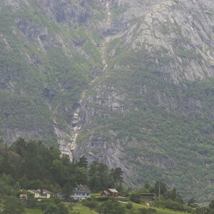 the magnificant Eidfjord valley church nesteld in the Hardanger Fjord
