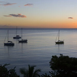 MARTINIQUE. French Antilles. West Indies. View of sunset & Caribbean Sea from historic