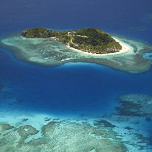 Matamanoa Island and coral reef, Mamanuca Islands, Fiji, South Pacific - aerial