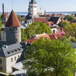 Medieval town walls and spire of St. Olavs church, view of Tallinn from Toompea hill