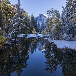 Merced River. Sentinel Bridge. Autumn first snow in Yosemite National Park, California