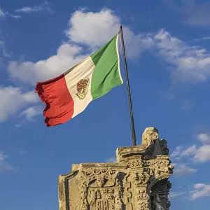 Mexican Flag and statues, Zocalo, Mexico City, Mexico