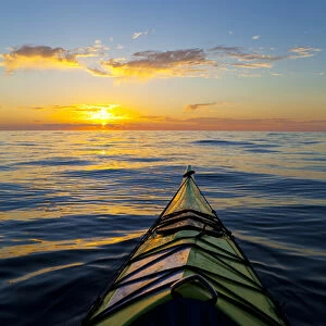Mexico, Baja, Sea of Cortez. Bow of kayak and sunrise