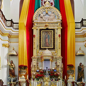 Mexico, Jalisco, Puerto Vallarta. Altar of Our Lady of Guadalupe church. Credit as