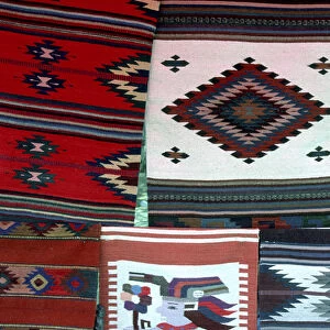 Mexico, Oaxaca. Hand woven blankets for sale in the market