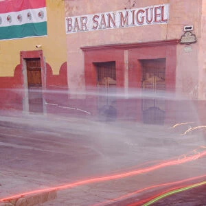 Mexico, San Miguel de Allende, Bar San Miguel entrance with car taillights. Credit as