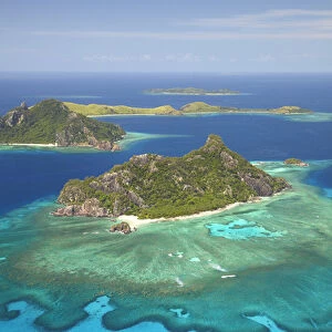 Monuriki Island and coral reef, Mamanuca Islands, Fiji, South Pacific - aerial