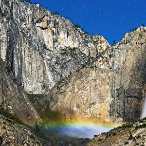 Moonbow and starry sky over Yosemite Falls, Yosemite National Park, California, USA