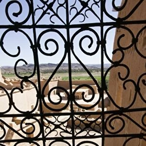 MOROCCO, South of the High Atlas, OUARZAZATE: Taourirt Kasbah viewed through lattice