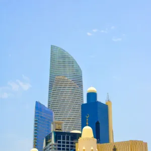 Mosque with modern high-rises in downtown, Abu Dhabi, United Arab Emirates