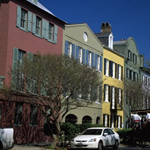 N. A. USA, South Carolina, Charleston. Colorful historic homes on Rainbow Row