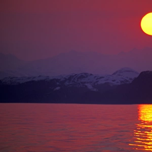 NA, USA, Alaska, Prince William Sound Sunset over the sound and the Chugach Mountains