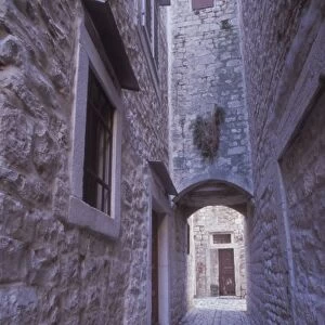 A narrow cobbled street in the back roads area of old town Trogir. Central Dalmatia