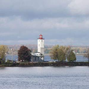 New York, Ogdensburg. Ogdensburg Lighthouse in autumn. Lighthouse Point, situated