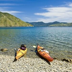 New Zealand, South Island, Marlborough Sounds. Sea kayaks on beach at Tawhitinui Reach