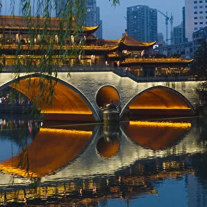 Night view of Anshun Bridge with reflection in Jin River, Chengdu, Sichuan Province