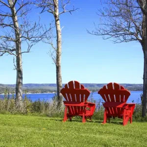 North America, Canada, Nova Scotia, Adirondack chairs near Cabot Trail, Cape Beton