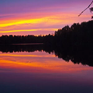 North America, Canada, Ontario, Quetico Park, Lake Agnes wilderness, red sunset