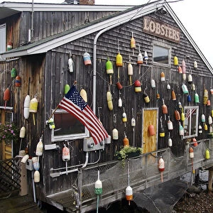 North America, USA, Maine, Bar Harbor. A seafood restaurant on the water decorated