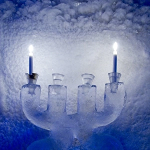 Norway, Nordland, Lofoten Archipelago, Gravdal. Ice Bar & Gallery. Ice candles