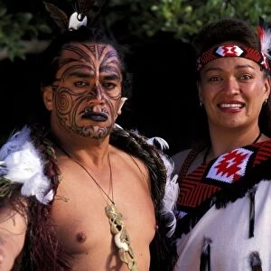 Oceania, New Zealand, North Island. Maori culture, man and woman warriors in native Maori costume