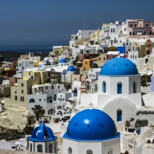 Oia Village Print: Blue Domes Over the Aegean Sea Oia Village Print: Blue Domes Over the Aegean Sea