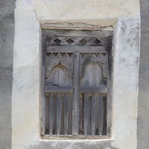 Oman, Dhofar, Salalah. Mirbat, the ancient capital of Dhofar. Typical home window detail