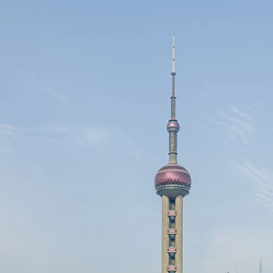 Pearl Tower over Pudong district skyline Shanghai, China